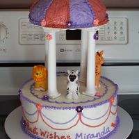 Carousel Baby Shower Cake Half round doom top, with little people plastic animals. TFL