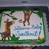 Jungle Theme Baby Shower This cake was decorated after a theme that was Target - possibly Tiddlie Winks - it is decorated with buttercream and fondant leaves. TFL