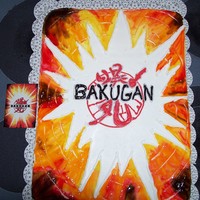 Bakugan Cake This is a sheet cake, decorated in buttercream and tinted pipeing gel, for my son's 6th Birthday - thank you for looking