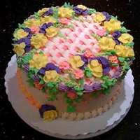 Birthday Cake With Spring Flowers Requested by my neighbor Liz for her mom. Liz's three little girls insisted Grandma's cake have plenty of flowers so it's...