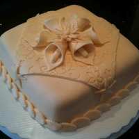 Monochromatic Cake My second fondant cake, I wanted to create one that was simple in both design and color. Fondant over cinnamon chocolate cake. TFL!