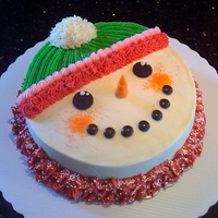 Frosty The Snowman Wearing His Turtleneck My version of the popular Frosty the Snowman cake. He's wearing a turtleneck and a thick, woolen cap. Cinnamon chocolate gluten-free...