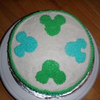 First Cake From Wilton Course 1 This was my first cake made for Wilton's course 1, practicing pattern transfer and star fill. I ran out of time to smooth the cake (...