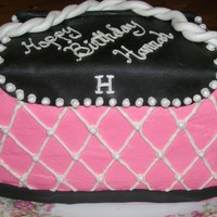 Purse Cake This was a 4 layer chocolate cake with a chocolate mouse filling. I baked a 10" and an 8" square, cut them in half and stacked (...