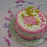 Baby In A Blanket This cake is covered in buttercream with fondant baby, moon, stars and wording. This was my first cake using fondant after a wilton class...