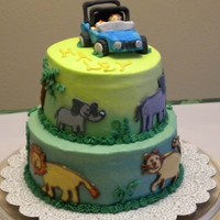 Safari Cake My 9 year old daughter drew pictures of her favorite safari animals. I put them on the cake using buttercream transfers. That's her...