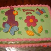 Hugs And Stitches...my Version The cake is a 9x13 chocolate with b/c icing. The decorations are made out of cookies.