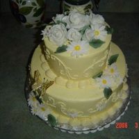 Debbies_Birthday.jpg This is a Birthday cake that I made for a friend. The bottom layer is chocolate with Pecan Cream Cheese filling and the top layer is...