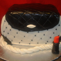 Black & White Purse My 2nd purse cake. Still learning as I go :) Chocolate cake with whipped chocolate ganache filling. Covered in fondant. "Lipstick"...