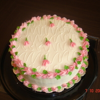 Rose Cake this is a white cake with custard filling and covered in buttercream.thank you all for looking.