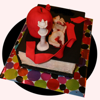 Twilight A cake that I made with my daughter for her friends birthday party. She molded the chess pieces, painted the flower petals and made the...