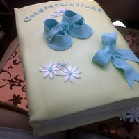 Quick Baby Shower Baby Book I needed to quickly put together a cake for a baby shower cake in a few hours for a friend. This was a quick baby shower book. Ideally I...