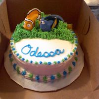 Odessa's Mini Cake 6x2in funfetti cake with butter-vanilla buttercream and store bought nemo and dori squirters