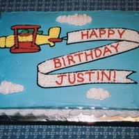 Bi-Plane Birthday I used a piece of clip art and the waxed paper/piping gel transfer method for the plane and banner. The clouds are made with a large...