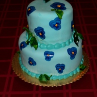 Blue Pansies This is a last minute surprise birthday cake I did for a friend of the family. Her husband told me she like blue and chocolate. After a...