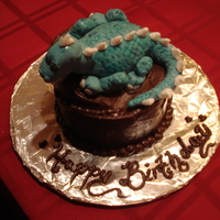 Dragon Birthday A quick cake I did for my sensei. Its based on the dragon that is the logo for the karate school. Just a simple chocolate cake with fudge...