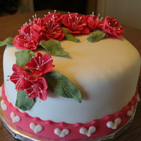 Fondant Flowers first time making these flowers was fun, cake is wasc with lemon filling.