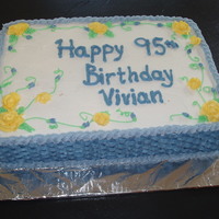 95Th Birthda Cake Blue basketweave with yellow roses and tiny blue sweet peas
