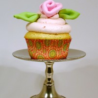 Ribbon Rose Upon A Cupcake Pink and Blue ribbon roses adorn lemon cupcakes with raspberry buttercream