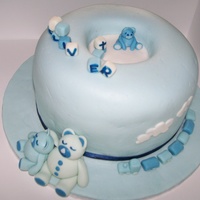 Teddies And Trains Cake This is a Chocolate and White Chocolate layered cake, with mmf icing, which I made for a Christening for a little boy.