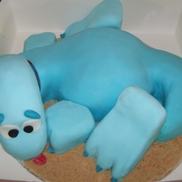 Blue Baby Dino Chocolate cake with cookies and cream. This is my first dinosaur cake, my husband helped me with his creativity, and thank you to '...