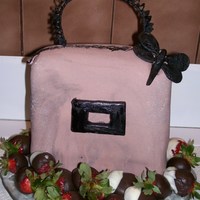 Marble Handbag With Chocolate Covered Strawberries This is a chocolate cake with vanilla buttercream, covered with marble fondant. I made this for my friends 24th birthday. Thankyou for...