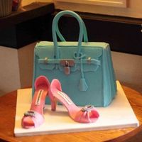 Birkin Bag And Manolos Cake This is my first attempt at a 3D purse cake and 2nd attempt at gumpaste shoes. i was really pleased with how it turned out in the end.