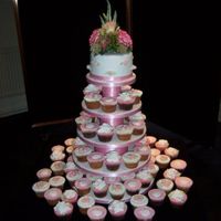 Rose And Seashell Wedding Cupcakes I made these cupcakes for a friend's wedding at the weekend. The cupcakes were vanilla and chocolate and the top tier was chocolate...
