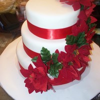 Christmas Wedding fondant covered, silk flowers. first wedding cake.
