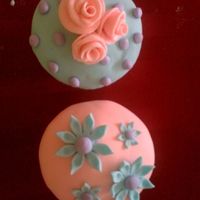 Flowers! These are the results of my experiment with cupcakes and fondant! I had so much fun making these. I made a few more, but I left the...