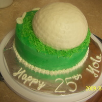 Golf Ball half sports ball on top of 8in round. green coconut for the grass and fondant tees.