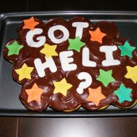 Got Heli? Cupcake Cake I made this for an event at my husband's RC Heli club in Snohomish Washington. Yellow cake, chocolate frosting, fondant stars &...