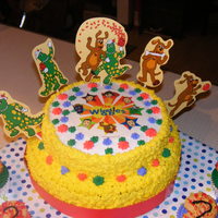 Wiggles Birthday Cake two tiered chocolate and vanilla cake with butter cream frosting and edible image.