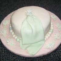 Daisy Cake The colors are a little faded in picture, more vibrant in real life. The cake is actually covered in marbled fondant, not really clear in...