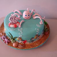 Under Water Cake This cake was for my son's birthday. The octopus is made with 50/50 gp + fondant. When I made the front right arm I wrapped the arm...