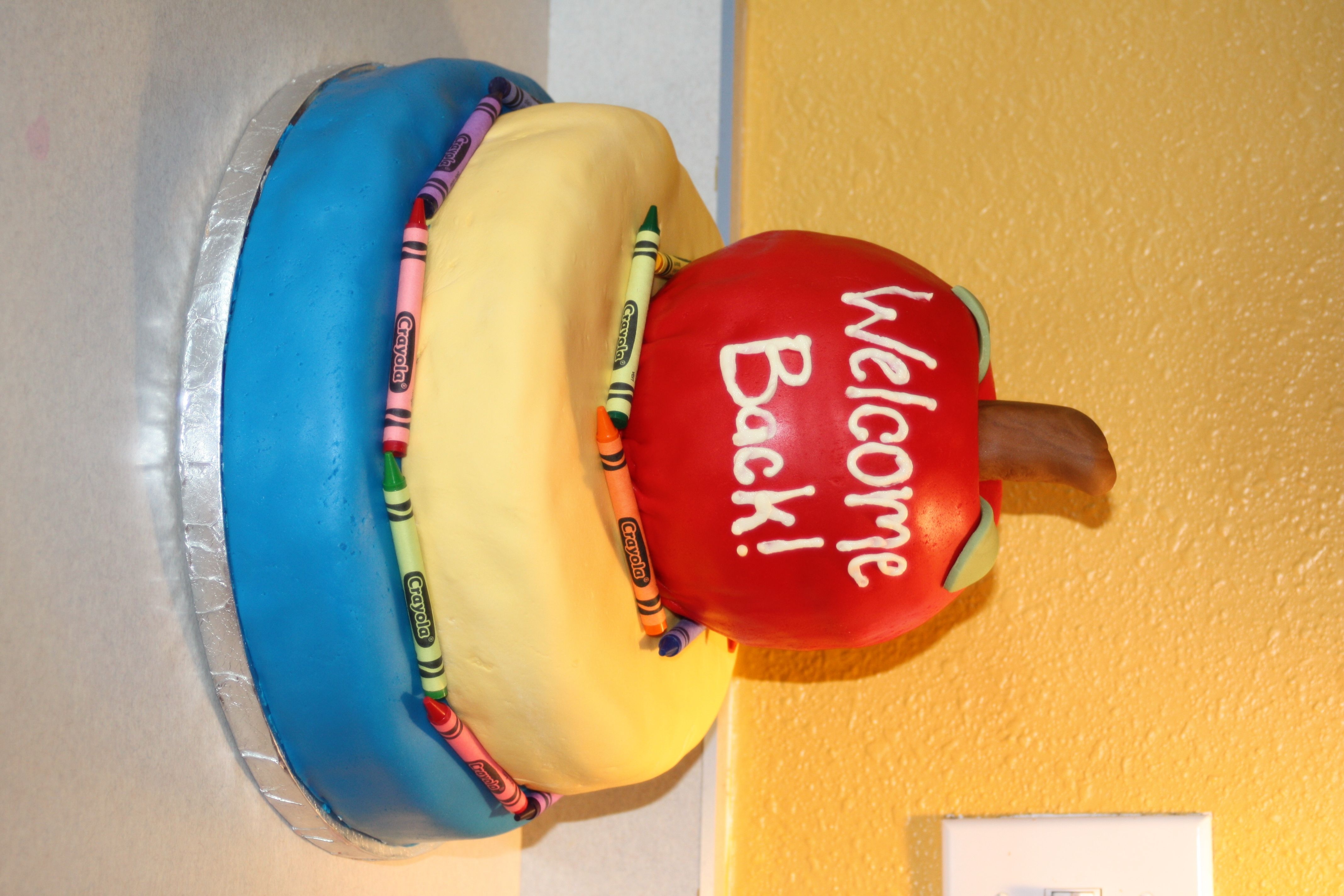 Back To School Cake I did this for my kid's classes today for back to school. Lots of fun. Tried to make my own fondant for the middle layer since I didn...