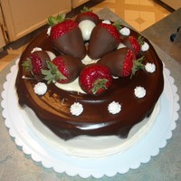 Chocolate Covered Strawberry Cake Chocolate cake with white chocolate pudding and fresh strawberry filling, frosted in almond buttercream with satiny chocolate glaze and cc...