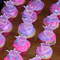 Princess Cupcakes WASC cupcakes with pink and purple swirled buttercream, topped with luster dusted fondant heart and Princess crown cupcake topper