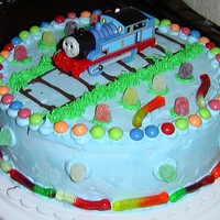 Thomas The Train Ice Cream Cake This was my first ice cream cake. The cake was marble with vanilla ice cream in the middle. My friend asked for candy on the cake... so...