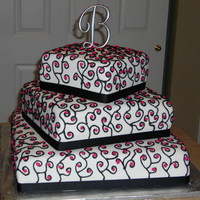 Black White And Pink Wedding my first wedding cake ever! turned out pretty nice, I think, the bride and groom loved it! Bottom tier is butter cake with strawberrry...