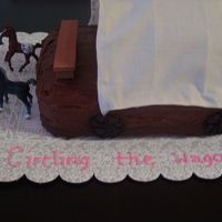 Wagon Cake The clients boss always says "Circling the wagons" so he wanted a cake of a wagon. The toys on top cover and horses are not...