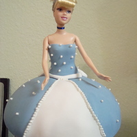 Princess Cake Chocolate dome cake with Cinderella Barbie. I had to cut a hole in styrofoam for her legs so I didn't have to cut them off. LOL