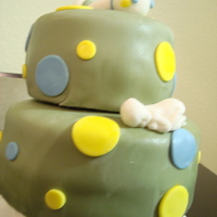 Welcome Home Baby Lemon cake with buttercream. Rattle and baby made out of fondant. I just got the mold for the baby in the mail yesterday and didn't...