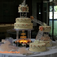 Coral And Chocolate Brown 16",12",8" lemon w/bc. 2-12" almond w/bc. 9" red velvet w/cc & bc