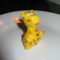Giraffe? Hmmm...I made this giraffe with older fondant that I kept adding shortening to so it would be so dry...it went a little bit down hill from...