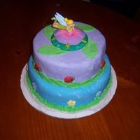 Tinker Bell Cake This is the first ca ke I have ever covered in Fondant.I have never used fondant before.I really enjoyed using MMF! This was made for my...