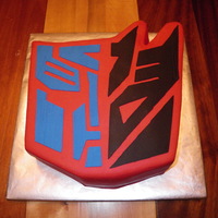 Transformers Groom's Cake The groom was VERY specific about what he wanted. Right down to what color each face should be and what the background should be. Half is...