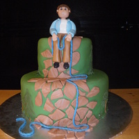 Rock Climbing Groom was an avid rock climber. This was my second fondant person. I was pretty pleased with him.
