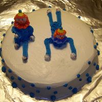 Clown Cake I was just practicing smoothing buttercream and then decided to try the clowns learned in class.