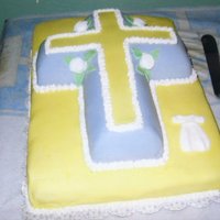 Baptism Cross Cake This was my first experience with fondant. I really enjoyed doing this cake.